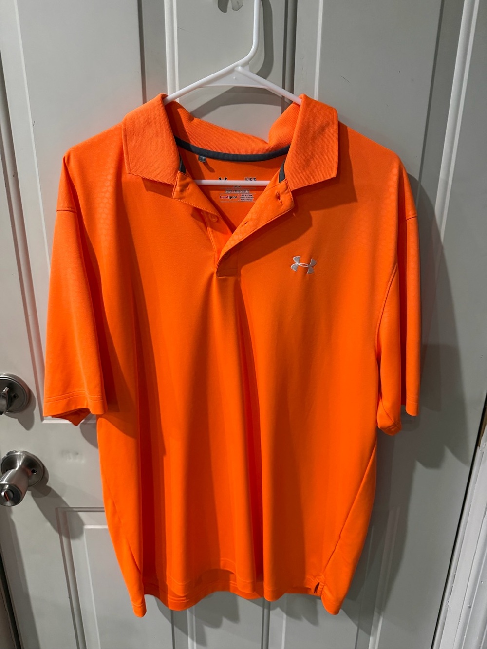 Under Armour Men’s Neon Orange Heat Gear Polo